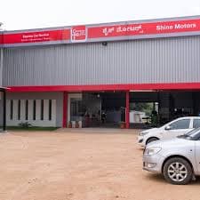 Shine Motors logo